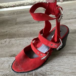 Red buckle block heels